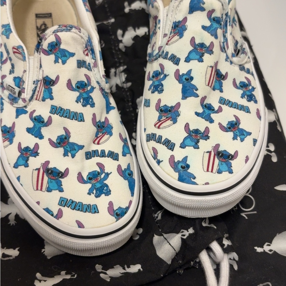 Vans White Slip-On Shoes with Blue Stitch Design